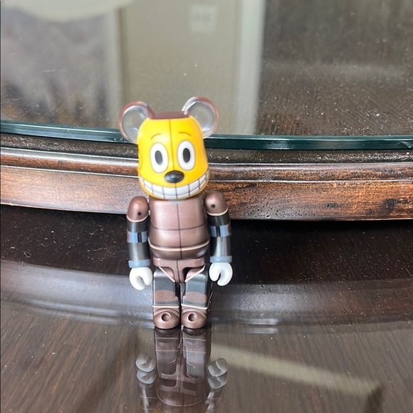 Brown and Yellow Toy Figure - Picture 1 of 7